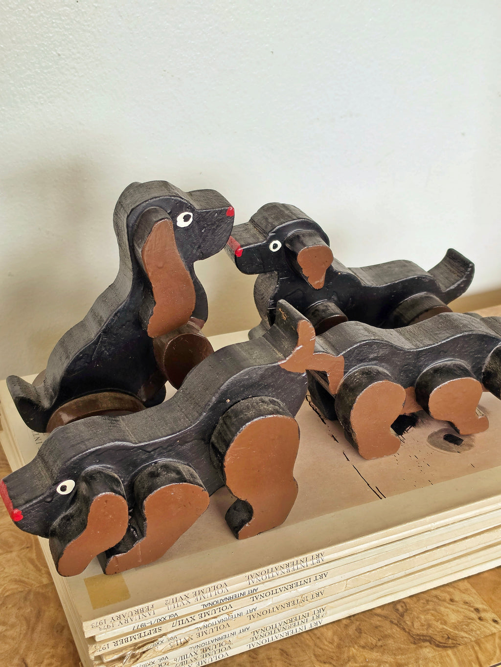 Set of Four Vintage Carved Wooden Dachshund Figures