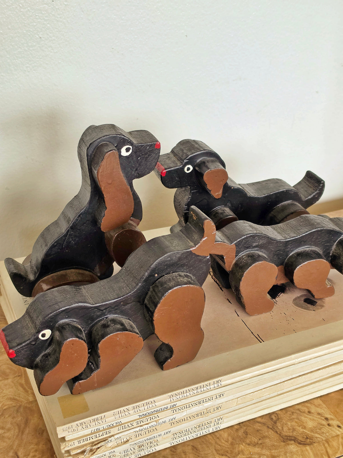 Set of Four Vintage Carved Wooden Dachshund Figures