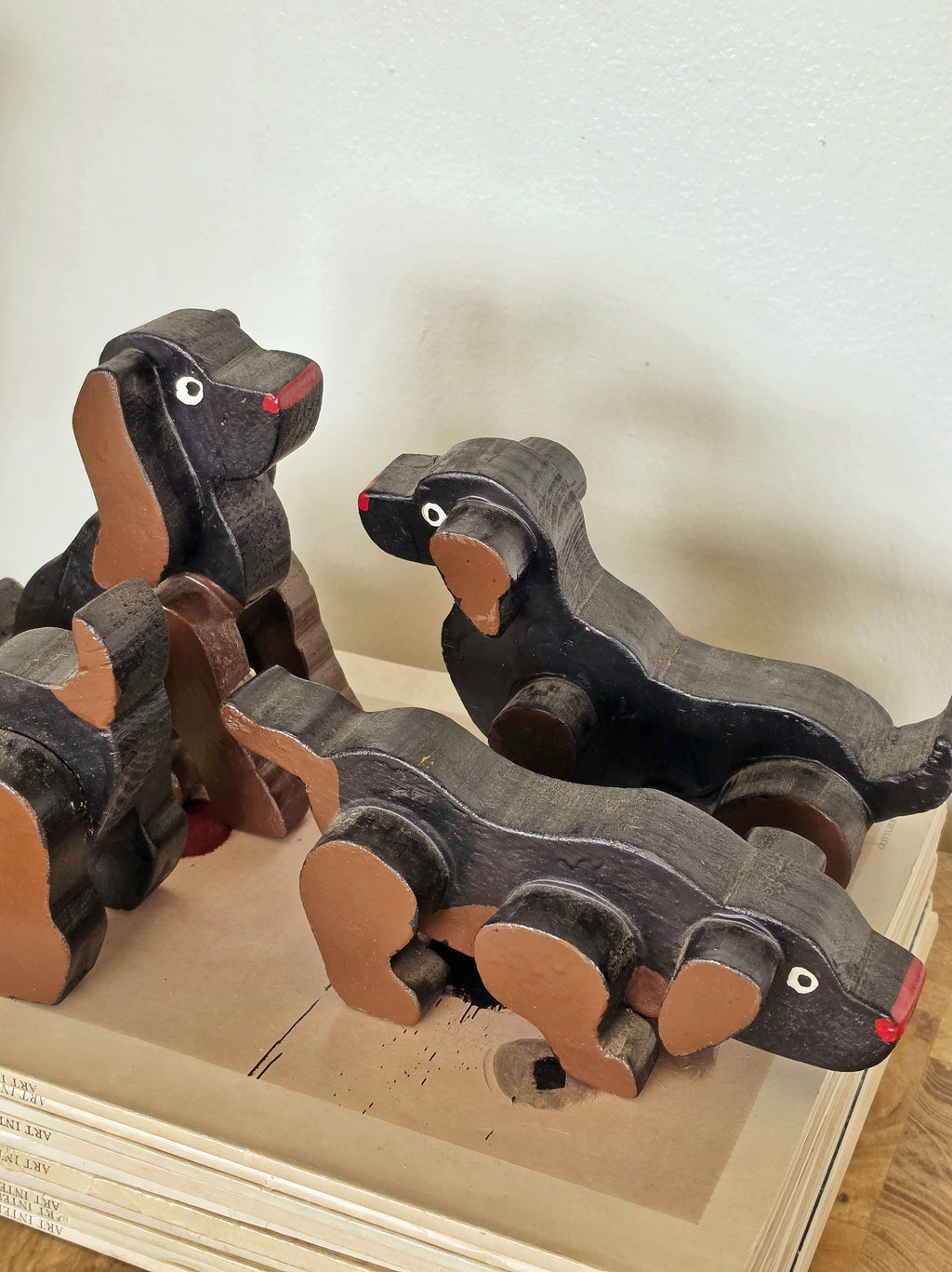 Set of Four Vintage Carved Wooden Dachshund Figures